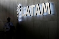 FILE PHOTO: LATAM airlines logo, is seen inside of the Commodore Arturo Merino Benitez International Airport in Santiago, Chile  April 25, 2019. REUTERS/Rodrigo Garrido/File Photo