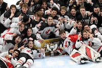 Team Canada celebrates championship after winning the 2024 IIHF ice hockey U18 world championships final match between the United States and Canada in Espoo, Finland, Sunday, May 5, 2024. (Jussi Nukari/Lehtikuva via AP)