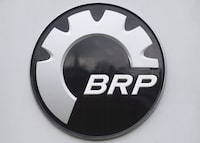 BRP Inc. says it disagrees with findings from Quebec’s workplace health and safety board that the snowmobile maker broke the law in underpaying workers it brought in to work at its plant in Quebec from a facility in Mexico. A BRP logo is shown at the research and innovation plant in Valcourt, Que., on November 9, 2012. THE CANADIAN PRESS/Graham Hughes