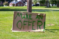 In an image provided by Kendall Waldman, a roadside sign in Pittsford, Mich. The 127 Yard Sale, an annual four-day event known as the ÒworldÕs longest yard sale,Ó is a test of endurance and attention. (Kendall Waldman via The New York Times) Ñ NO SALES; FOR EDITORIAL USE ONLY WITH NYT STORY MULTISTATE YARD SALE BY KENDALL WALDMAN FOR AUG. 31, 2023. ALL OTHER USE PROHIBITED. Ñ