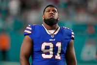Buffalo Bills defensive tackle Ed Oliver (91) walks on the field before an NFL football game against the Miami Dolphins, Sunday, Jan. 7, 2024, in Miami Gardens, Fla. (AP Photo/Lynne Sladky)