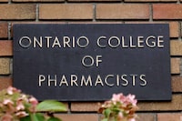 A sign for the Ontario College of Pharmacists is seen at its headquarters in Toronto on Friday, Nov. 1, 2019. The college was holding a disciplinary hearing into pharmacist Jason Newman, of London. Ont., who was accused of misconduct in how he dispensed the anti-opioid drug naloxone. THE CANADIAN PRESS/Colin Perkel
