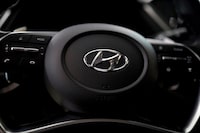 FILE PHOTO: The logo of Hyundai Motors is seen on a steering wheel on display at the company's headquarters in Seoul, South Korea, March 22, 2019. REUTERS/Kim Hong-Ji/File Photo