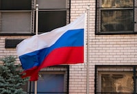 The Russian flag flies over the building that houses the Russian Mission to the United nations March 26, 2018 in New York.
The United States joined Britain's allies in Europe and around the world March 26, 2018 in expelling scores of suspected Russian spies in an unprecedented response to a nerve agent attack. Washington led the way, ordering out 60 alleged agents, in a new blow to US-Russia ties less than a week after President Donald Trump congratulated Vladimir Putin on his re-election.
 / AFP PHOTO / Don EMMERTDON EMMERT/AFP/Getty Images