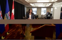 Alberta Premier Danielle Smith makes her way to the podium to introduce legislation addressing agreements between the federal government and provincial entities in Edmonton on Wednesday April 10, 2024. A national organization of post-secondary teachers is calling on Alberta to either change a proposed gatekeeping bill or scrap it altogether. THE CANADIAN PRESS/Jason Franson