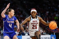 South Carolina guard Raven Johnson (25) drives against Presbyterian guard Tilda Sjokvist during the first half of a first-round college basketball game in the women's NCAA Tournament in Columbia, S.C., Friday, March 22, 2024. (AP Photo/Nell Redmond)