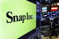 FILE - The logo for Snap Inc. displayed above a post on the floor of the New York Stock Exchange, Feb. 5, 2020. Nevada’s attorney general has launched a go-it-alone legal fight accusing TikTok, Snapchat and Meta of creating what one lawsuit calls “an addiction machine” that exploits children too young to have self-control. Three lawsuits filed Tuesday, Jan.30, 2024, in state court allege the platforms put kids at risk of auto accidents, drug overdoses, suicides, eating disorders and sexual exploitation. (AP Photo/Richard Drew, File)