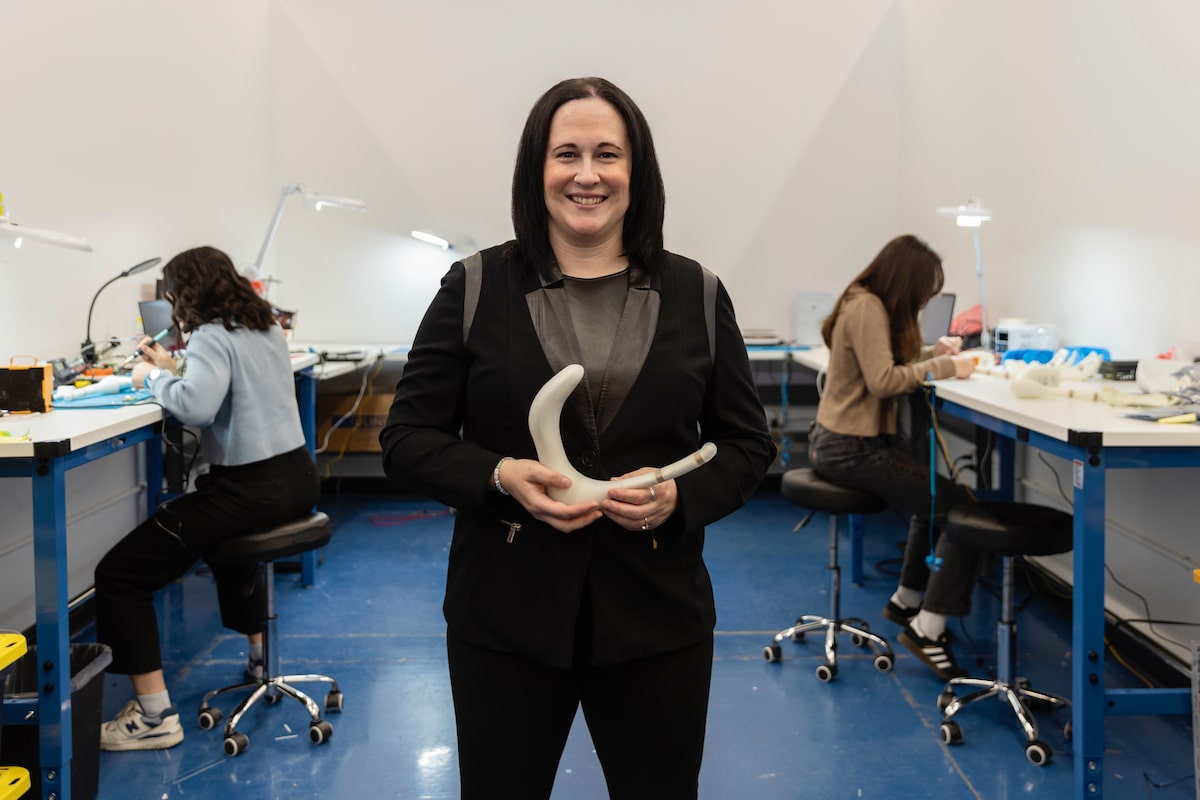 Rachel Bartholomew, founder and CEO at Hyivy Health, stands in her Kitchener, Ont. headquarters holding the Floora, the femtech company’s Bluetooth-connected pelvic rehabilitation device.