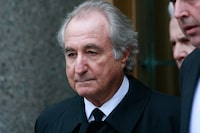 FILE: Bernard Madoff, the financier who ran the largest Ponzi scheme in history, has died of natural causes in federal prison. NEW YORK - MARCH 10:  Accused $50 billion Ponzi scheme swindler Bernard Madoff exits federal court March 10, 2009 in New York City. Madoff was attending a hearing on his legal representation and is due back in court Thursday.  (Photo by Mario Tama/Getty Images)