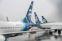 Grounded Alaska Airlines Boeing 737 Max 9 jets on the tarmac at Seattle-Tacoma International Airport in SeaTac, Wash., on Monday, Jan. 8, 2024. The Federal Aviation Administration said Boeing’s instructions for how airlines should check the planes was insufficient and the company would revise them. (M. Scott Brauer/The New York Times)