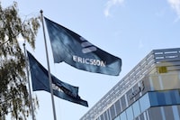 FILE PHOTO: Flags with Ericsson logo are pictured outside company's head office in Stockholm, Sweden, October 4 , 2016. TT NEWS AGENCY/Maja Suslin via REUTERSATTENTION EDITORS - THIS IMAGE WAS PROVIDED BY A THIRD PARTY. FOR EDITORIAL USE ONLY. NOT FOR SALE FOR MARKETING OR ADVERTISING CAMPAIGNS. THIS PICTURE IS DISTRIBUTED EXACTLY AS RECEIVED BY REUTERS, AS A SERVICE TO CLIENTS. SWEDEN OUT. NO COMMERCIAL OR EDITORIAL SALES IN SWEDEN. NO COMMERCIAL SALES./File Photo