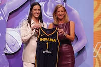 Apr 15, 2024; Brooklyn, NY, USA; Caitlin Clark poses with WNBA commissioner Cathy Engelbert after she is selected with the number one overall pick to the Indiana Fever in the 2024 WNBA Draft at Brooklyn Academy of Music. Mandatory Credit: Brad Penner-USA TODAY Sports