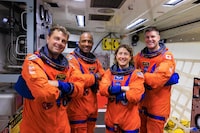 Months away from a historic trip around the moon and back, Canadian astronaut Jeremy Hansen says humanity's upcoming missions to further explore deep space will inspire generations to come, much like NASA's Apollo expeditions did for him. A NASA photo shows, from left, Reid Wiseman, Victor Glover, and Christina Koch, and Hansen during a test at Kennedy Space Center in Florida on Sept. 20.THE CANADIAN PRESS/NASA via AP