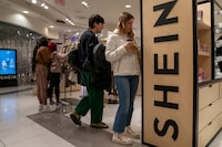 People shop at the Shein Holiday pop-up shop inside of Times Squares Forever 21 in New York City, U.S., November 10, 2023.