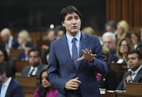 Prime Minister Justin Trudeau responds during question period in the House of Commons on Parliament Hill in Ottawa on Wednesday, Feb. 14, 2024. The Yukon government is pouring cold water on a suggestion by Trudeau that a bridge is being built across the Yukon River in Dawson City, after years of struggle to construct a sanctioned route on ice. THE CANADIAN PRESS/Sean Kilpatrick