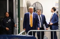 NEW YORK, NEW YORK - MAY 2: Former U.S. President Donald Trump and attorney Todd Blanche (C) return after a brief break in his trial for allegedly covering up hush money payments at Manhattan Criminal Court on May 2, 2024 in New York City. Trump was charged with 34 counts of falsifying business records last year, which prosecutors say was an effort to hide a potential sex scandal, both before and after the 2016 presidential election. Trump is the first former U.S. president to face trial on criminal charges. (Photo by Charly Triballeau-Pool/Getty Images)