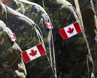 Members of the Canadian Armed Forces, in Calgary on July 8, 2016. The company overseeing the federal government's 900-million-dollar settlement deal with military members who experienced sexual misconduct in uniform has admitted to more privacy breaches despite repeated promises to have fixed the problem.THE CANADIAN PRESS/Jeff McIntosh