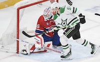 Dallas Stars' Tyler Seguin (91) scores against Montreal Canadiens goaltender Sam Montembeault during second period NHL hockey action in Montreal, Saturday, February 10, 2024. THE CANADIAN PRESS/Graham Hughes