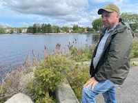 Pierre Grenier, president of the Lac-Megantic anglers association, is shown in downtown Lac-Megantic, Que., on Friday, May 26, 2023. Grenier says that ever since the 2013 train derailment in Lac-Megantic, Que., spilled 100,000 litres of crude oil into the Chaudière River, the fishing hasn't been as good. THE CANADIAN PRESS/Stéphane Blais