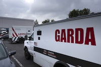 Armored trucks are parked outside the offices of GardaWorld in the Sylmar section of Los Angeles on Thursday, April 4, 2024. Thieves stole as much $30 million in an Easter Sunday burglary at a Los Angeles money storage facility in one of the largest cash heists in city history. (AP Photo/Richard Vogel)