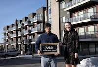 Taehoon Kim with his realtor Brielle Mickey outside of his new condo in Calgary, Alberta March 11, 2024. Todd Korol/The Globe and Mail