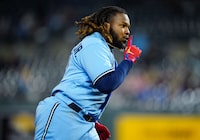 Apr 5, 2023; Kansas City, Missouri, USA; Toronto Blue Jays first baseman Vladimir Guerrero Jr. (27) gestures to the dugout as he rounds the bases after hitting a home run during the eighth inning against the Kansas City Royals at Kauffman Stadium. Mandatory Credit: Jay Biggerstaff-USA TODAY Sports