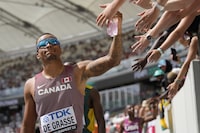 Andre De Grasse receives high fives from fans during the men's 200-metre heat at the World Athletics Championships in Budapest, Hungary, Wednesday, Aug. 23, 2023. Brave is unbeatable is the theme for Canada's Olympic team competing in Paris this summer.
The Canadian Olympic Committee and broadcast rightsholder CBC unveiled the marketing campaign today. THE CANADIAN PRESS/AP/Ashley Landis