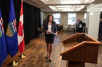 Alberta Premier Danielle Smith makes her way to the podium to introduce legislation addressing agreements between the federal government and provincial entities in Edmonton on Wednesday April 10, 2024. THE CANADIAN PRESS/Jason Franson.