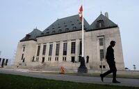 Business groups in Alberta are celebrating Friday's decision by the Supreme Court of Canada that ruled the federal government's impact assessment law is largely unconstitutional. A man walks past the Supreme Court of Canada, Friday, June 16, 2023 in Ottawa. THE CANADIAN PRESS/Adrian Wyld