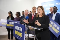 Manitoba PC Leader Heather Stefanson speaks to the media surrounded by Progressive Conservative candidates at the PC Party campaign office, the day before the Manitoba provincial election in Winnipeg on Monday, October 2, 2023. THE CANADIAN PRESS/David Lipnowski