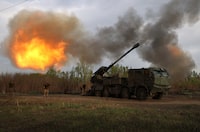 Gunners from 43rd Separate Mechanized Brigade of the Armed Forces of Ukraine fire at Russian position with a 155 mm self-propelled howitzer 2C22 "Bohdana", in the Kharkiv region, on April 21, 2024, amid the Russian invasion in Ukraine. (Photo by Anatolii STEPANOV / AFP) (Photo by ANATOLII STEPANOV/AFP via Getty Images)