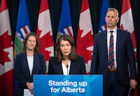 Alberta Premier Danielle Smith speaks on invoking her government’s sovereignty act over federal clean energy regulations, along with Rebecca Schulz, Minister of Environment and Protected Areas and Nathan Neudorf, Minister of Affordability and Utilities, in Edmonton on Monday November 27, 2023. The Alberta government is helping fund what it says is Canada's first test site for geothermal energy drilling techniques.THE CANADIAN PRESS/Jason Franson.