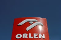 FILE PHOTO: The logo of PKN Orlen, Poland's top oil refiner, is pictured at petrol station in Warsaw, Poland April 25, 2019. REUTERS/Kacper Pempel/File Photo