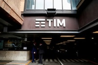 FILE PHOTO: The Tim logo is seen at its headquarters in Rome, Italy November 22, 2021. REUTERS/Yara Nardi/File Photo
