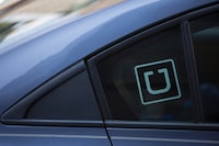 (FILES) In this file photo taken on July 09, 2019 the Uber logo is seen on a car in Washington, DC. - A California appeals court on March 13, 2023 backed a state law letting Uber, Lyft and other app-based, on-demand companies treat drivers as independent contractors rather than employees. The ruling came as a victory for the ride-share firms, which had backed Proposition 22 ahead of its passage in the state in 2020. (Photo by Alastair Pike / AFP) (Photo by ALASTAIR PIKE/AFP via Getty Images)