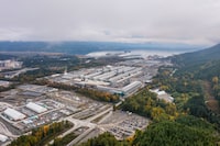 View of Rio Tinto Alcan smelter, Kitimat, BC.  (10-05-2023). The middle group of buildings is where reduction happens and casting towards the buildings at the harbour and wharf