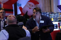 Traders work on the floor at the New York Stock Exchange (NYSE) in New York City, U.S., December 15, 2023.  REUTERS/Brendan McDermid