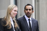 Umar Zameer reacts beside lawyer Alexandra Heine during a press conference following his not-guilty verdict, in Toronto, Sunday, April 21, 2024. THE CANADIAN PRESS/Christopher Katsarov