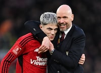 MANCHESTER, ENGLAND - MARCH 17: Alejandro Garnacho of Manchester United is embraced by Erik ten Hag, Manager of Manchester United, after the Emirates FA Cup Quarter Final between Manchester United and Liverpool FC at Old Trafford on March 17, 2024 in Manchester, England. (Photo by Michael Regan/Getty Images)