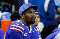 FILE - Buffalo Bills' Von Miller watches from the bench during the second half of an NFL football game against the Cleveland Browns, Sunday, Nov. 20, 2022, in Detroit. Police in Dallas have issued an arrest warrant for Buffalo Bills linebacker Von Miller on charges stemming from a “major disturbance” at a home on Wednesday, Nov. 29, 2023. (AP Photo/Duane Burleson, File)