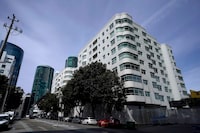FILE - The building where a technology executive was fatally stabbed outside of is shown in San Francisco, Thursday, April 6, 2023.  The 38-year-old tech consultant charged in the stabbing death of Cash App founder Bob Lee made his first appearance in a San Francisco courtroom Friday, April 14 but did not enter a plea.  (AP Photo/Jeff Chiu, File)