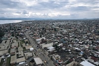 This aerial view, taken on September 10, 2023, shows the city of Goma, in eastern Democratic Republic of Congo. Lake Kivu is visible in the background. (Photo by ALEXIS HUGUET / AFP) (Photo by ALEXIS HUGUET/AFP via Getty Images)