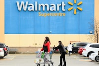 Walmart Canada is launching a national pilot program for customers to recycle their reusable shopping bags.People leave a Walmart store in Mississauga, Ont., Thursday, Nov. 26, 2020. THE CANADIAN PRESS/Nathan Denette