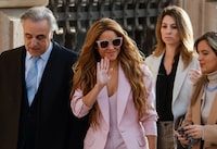 Colombian singer Shakira and her lawyer Pau Molins arrive at court for her trial facing allegations of tax fraud, in Barcelona, Spain November 20, 2023. REUTERS/Albert Gea?