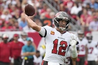 Tampa Bay Buccaneers quarterback Tom Brady passes during the first half of an NFL football game between the Carolina Panthers and the Tampa Bay Buccaneers on Sunday, Jan. 1, 2023, in Tampa, Fla. (AP Photo/Chris O'Meara)