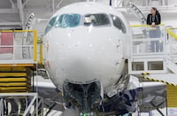 Unionized workers at an Airbus assembly plant north of Montreal have rejected a contract offer for the third time. An Airbus employee works on the assembly line at the company's plant in Mirabel, Que., Feb. 20, 2020. THE CANADIAN PRESS/Graham Hughes