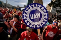 FILE - United Auto Workers members attend a rally in Detroit, Friday, Sept. 15, 2023. The UAW is conducting a strike against Ford, Stellantis and General Motors. (AP Photo/Paul Sancya, File)