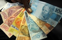 This file photo taken on December 19, 2011, shows Brazilian Real bank notes in Rio de Janeiro, Brazil.