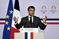 FILE PHOTO: French President Emmanuel Macron delivers a speech to present his New Year's wishes to elite athletes ahead of the Paris 2024 Olympic and Paralympic Games,  at France's National Institute of Sport, Expertise, and Performance (INSEP) in Paris, France,  January 23, 2024. STEPHANE DE SAKUTIN/Pool via REUTERS/File Photo
