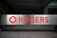 Rogers says it has completed the country's first successful satellite-to-mobile phone call, as the company pushes to bring the technology to the entire country next year. The Rogers logo is photographed at the Toronto office on Monday, September 30, 2019. THE CANADIAN PRESS/ Tijana Martin